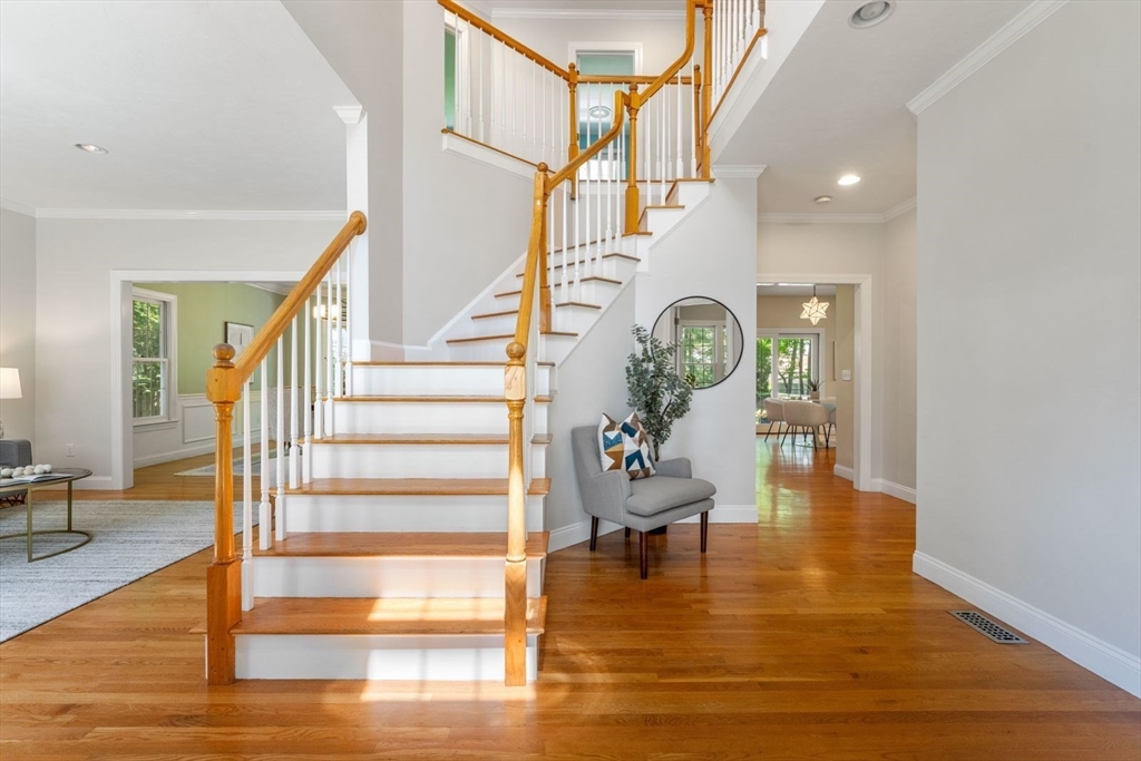 33 Bond Street Needham, MA 02492 - Photo 3 of 35 a view of entryway and hall with wooden floor