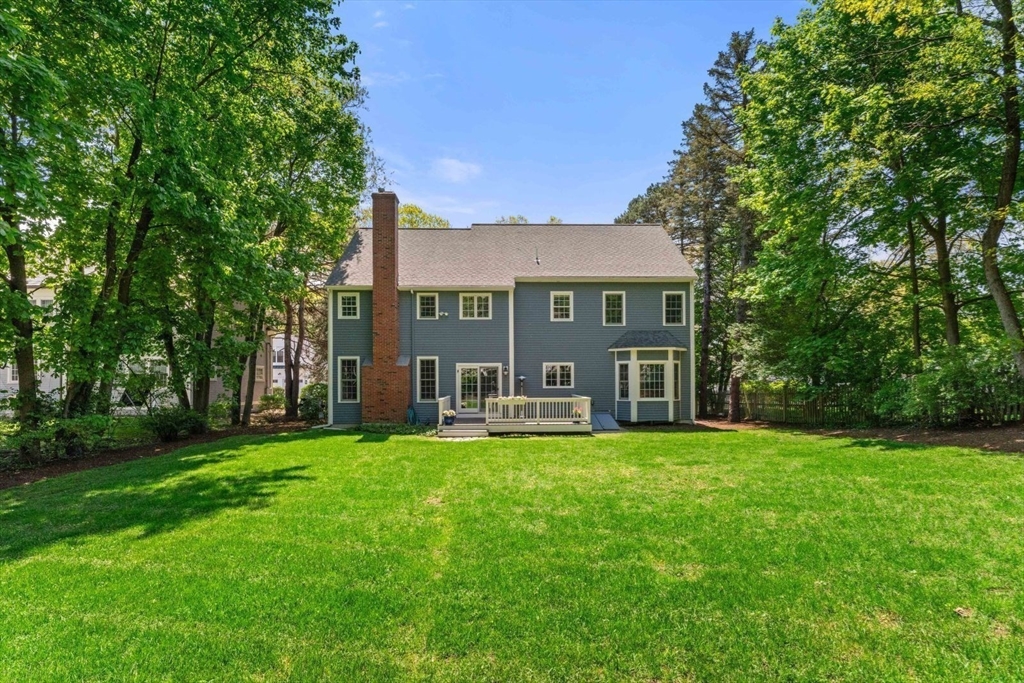 33 Bond Street Needham, MA 02492 - Photo 35 of 35 a view of a building with a yard