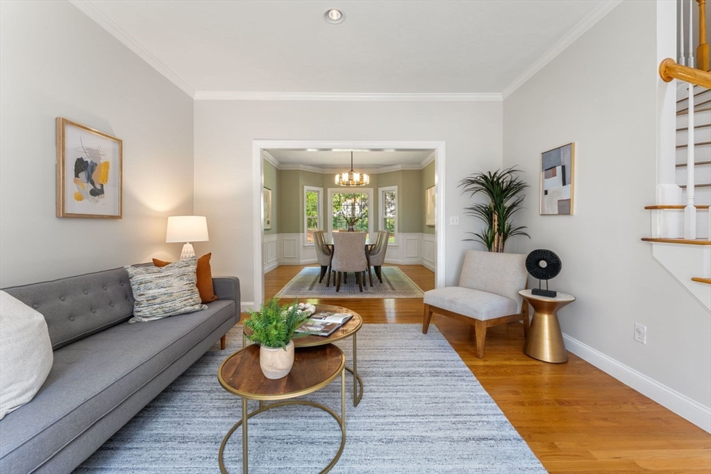 33 Bond Street Needham, MA 02492 - Photo 6 of 35 a living room with furniture and a lamp