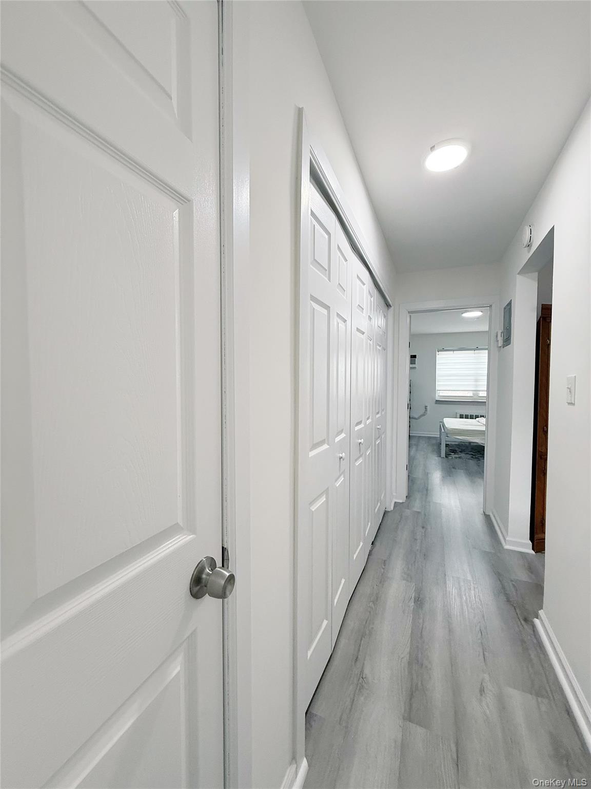 69-09 150th Street, Unit 320A Queens, NY 11367 - Photo 4 of 7 a view of a hallway