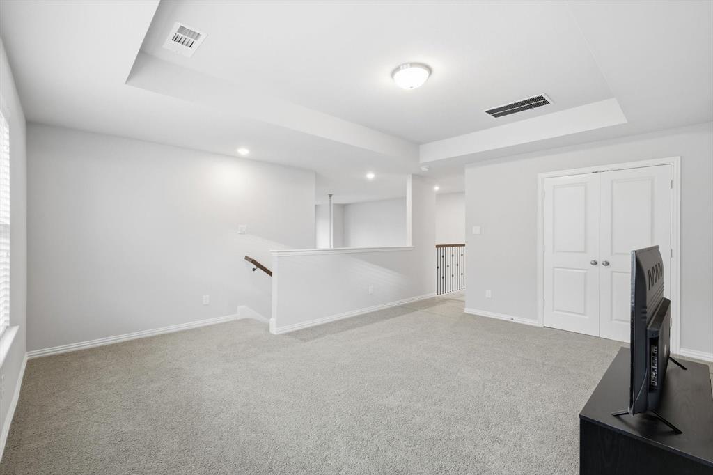 1708 Bird Cherry Lane Prosper, TX 75078 - Photo 25 of 32 a view of empty room