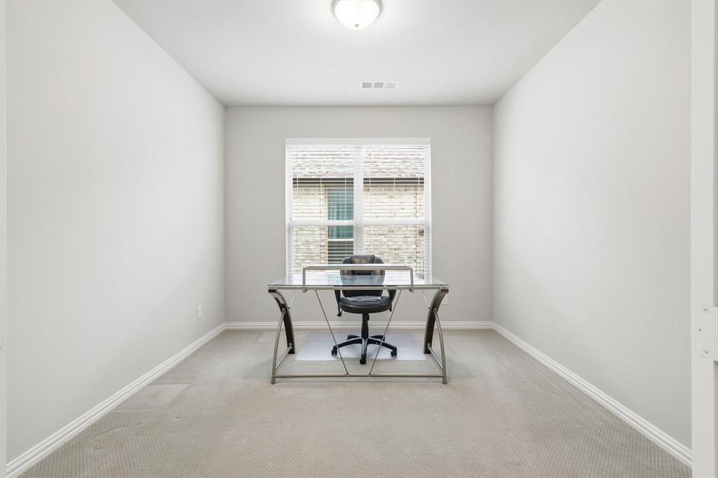 1708 Bird Cherry Lane Prosper, TX 75078 - Photo 8 of 32 a dining room with furniture and window