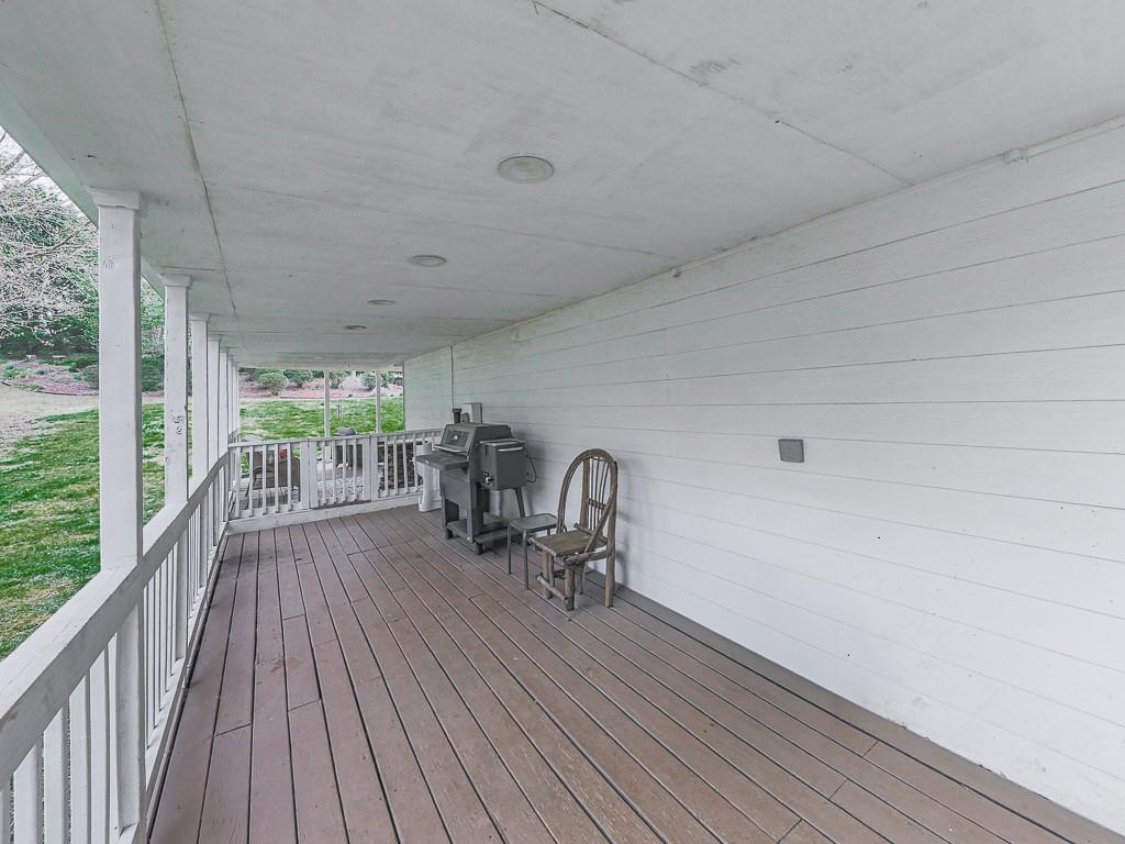 68 Arbor Hills Road South Talking Rock, GA 30175 - Photo 21 of 36 a view of a chairs in a balcony
