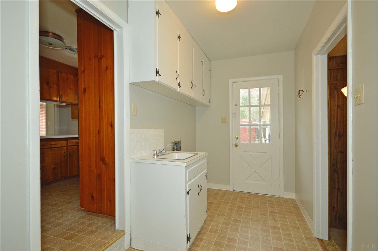 4762 Anna Simpson Road Milton, FL 32583 - Photo 31 of 47 door from carport, laundry room & leads to den