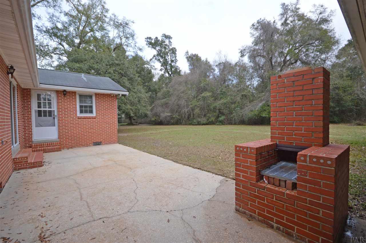 4762 Anna Simpson Road Milton, FL 32583 - Photo 35 of 47 with outdoor fireplace