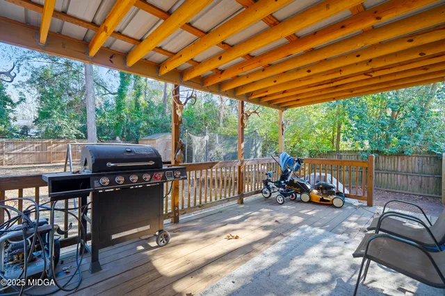 a view of a two chairs in the patio