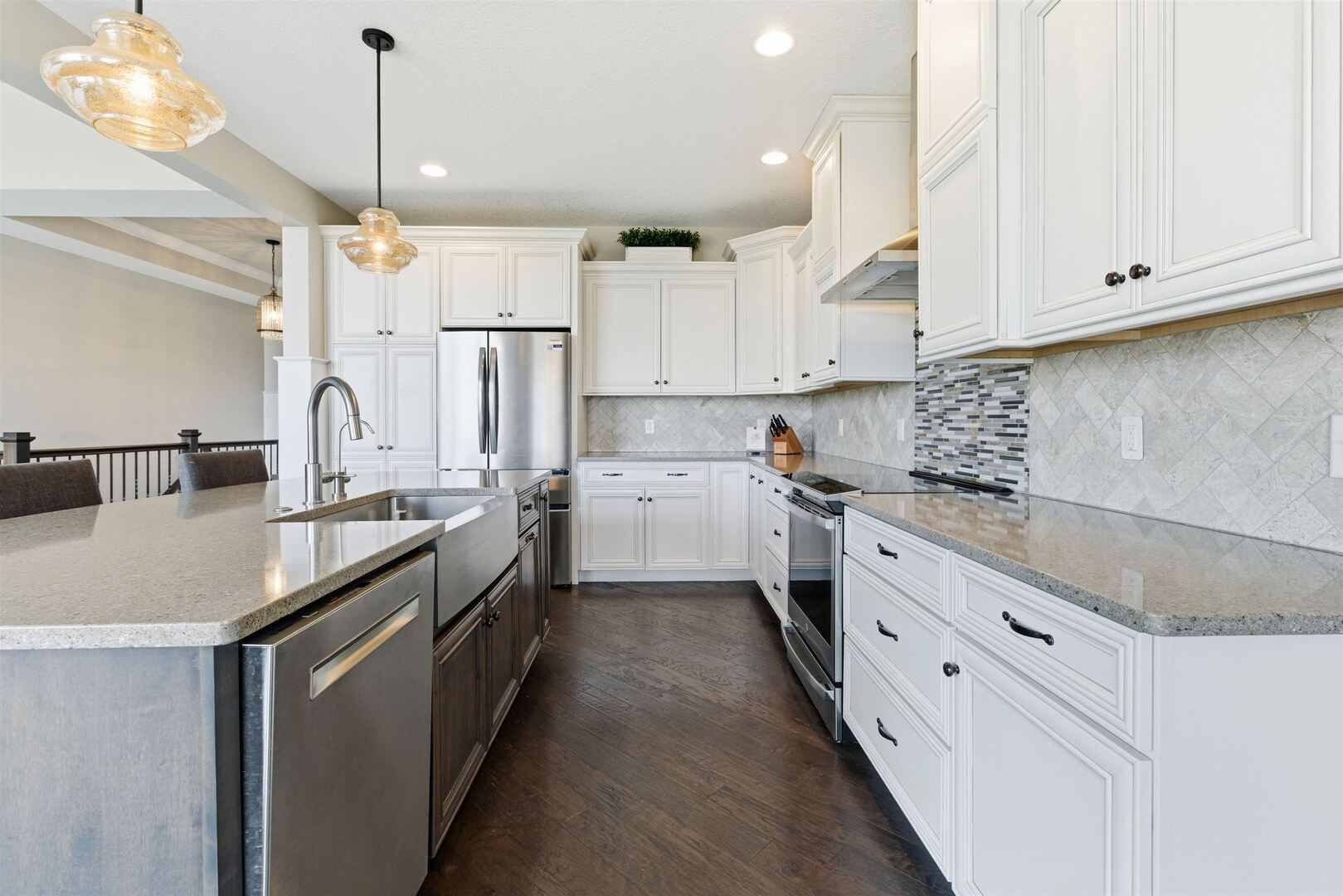6478 Spring Creek Drive Bettendorf, IA 52722 - Photo 15 of 39 a kitchen with granite countertop a sink a counter space appliances and cabinets