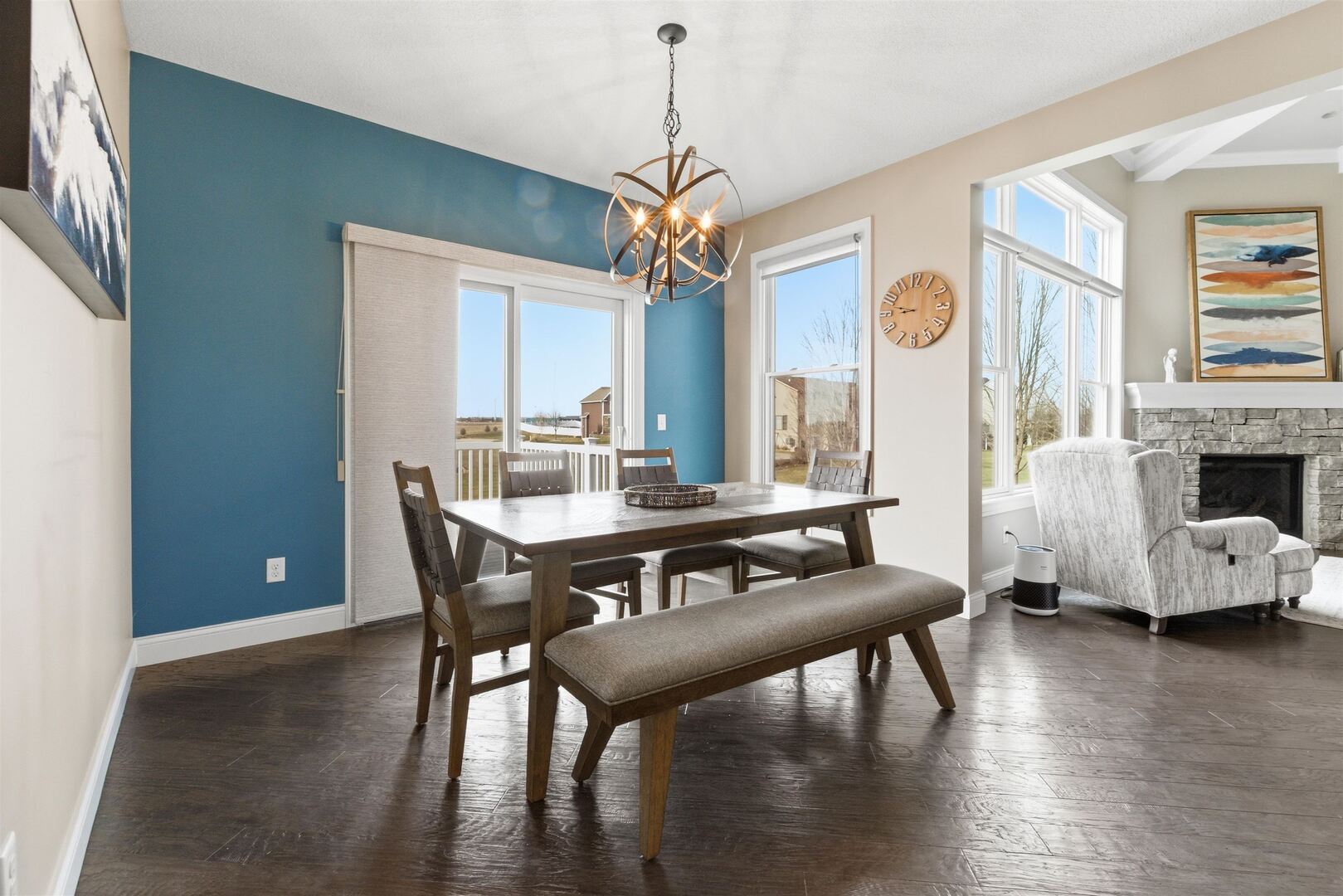 6478 Spring Creek Drive Bettendorf, IA 52722 - Photo 17 of 39 a view of a dining room with furniture window and wooden floor