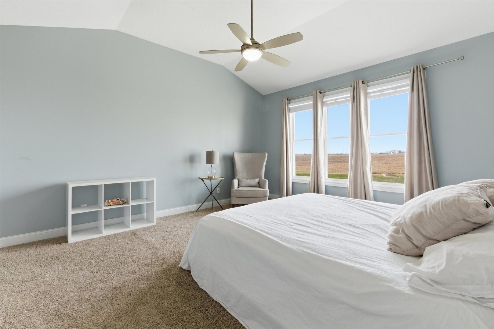 6478 Spring Creek Drive Bettendorf, IA 52722 - Photo 21 of 39 a bedroom with a large bed and a window