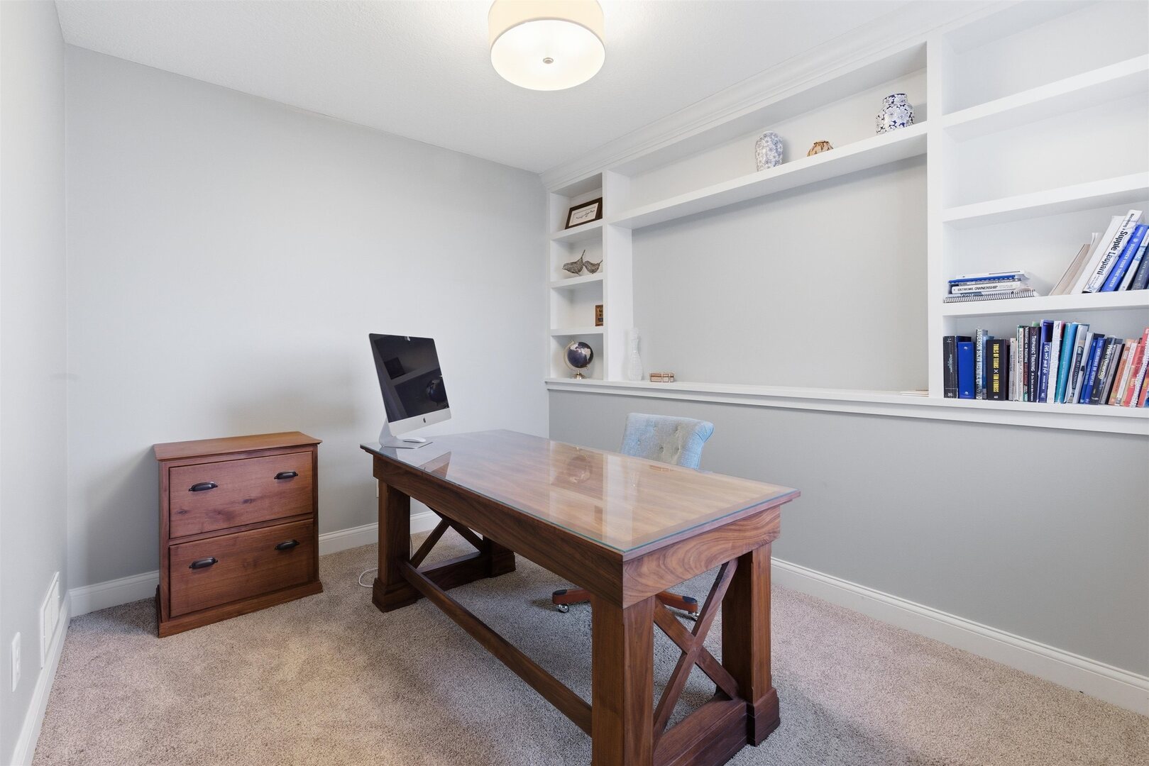 6478 Spring Creek Drive Bettendorf, IA 52722 - Photo 35 of 39 a room that has a table and chairs in it