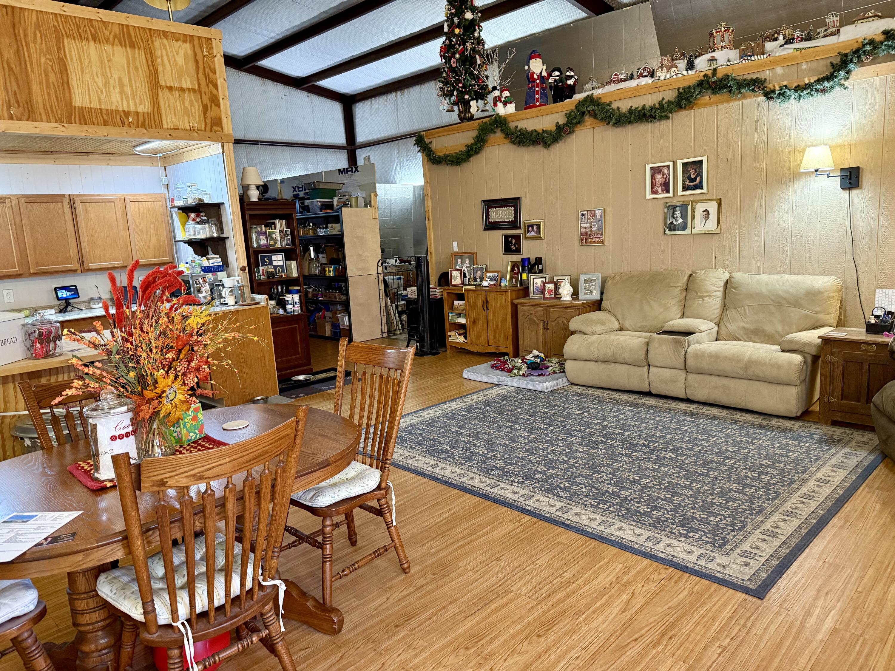 503 2nd Street Lorenzo, TX 79343 - Photo 2 of 13 a living room with lots of furniture and a rug