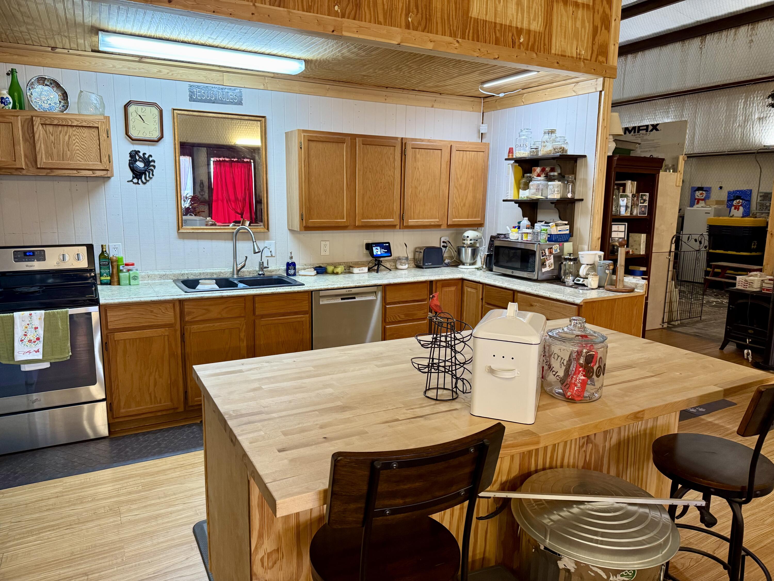 503 2nd Street Lorenzo, TX 79343 - Photo 3 of 13 a large kitchen with a table and chairs in it