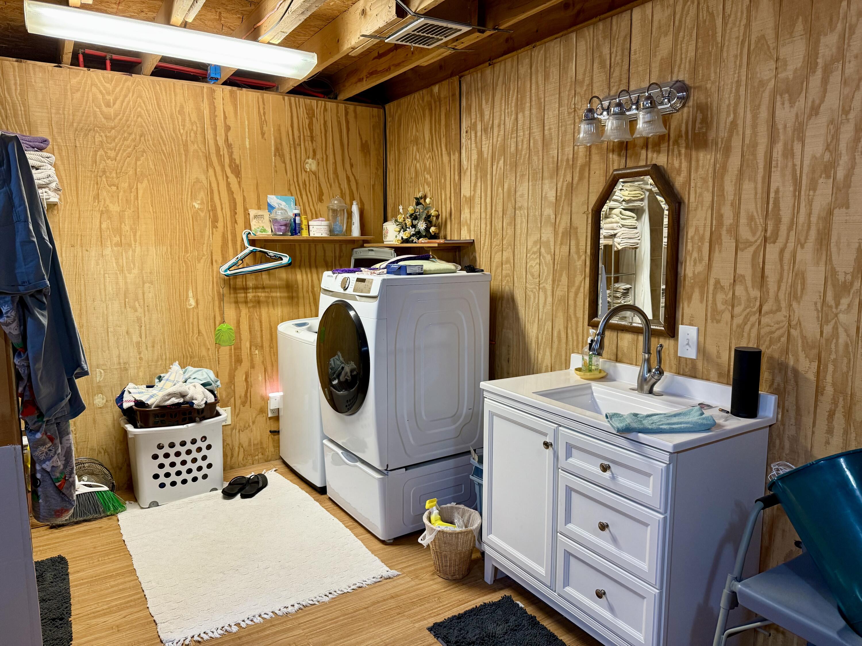 503 2nd Street Lorenzo, TX 79343 - Photo 10 of 13 a bathroom with a sink and a mirror