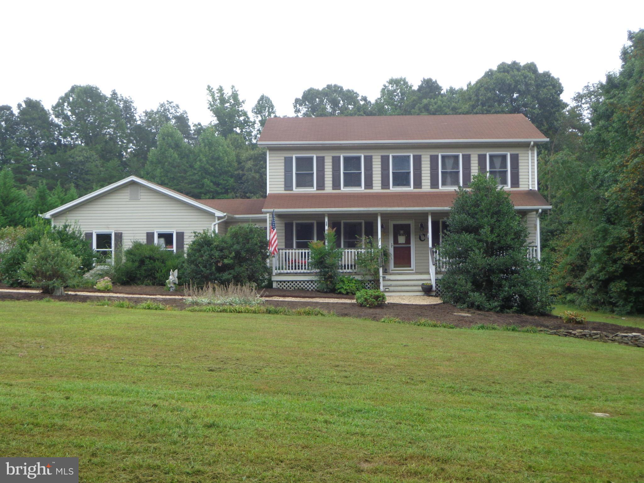 9323 Settle School Road Rixeyville, VA 22737 - Photo 1 of 30 a front view of a house with a yard