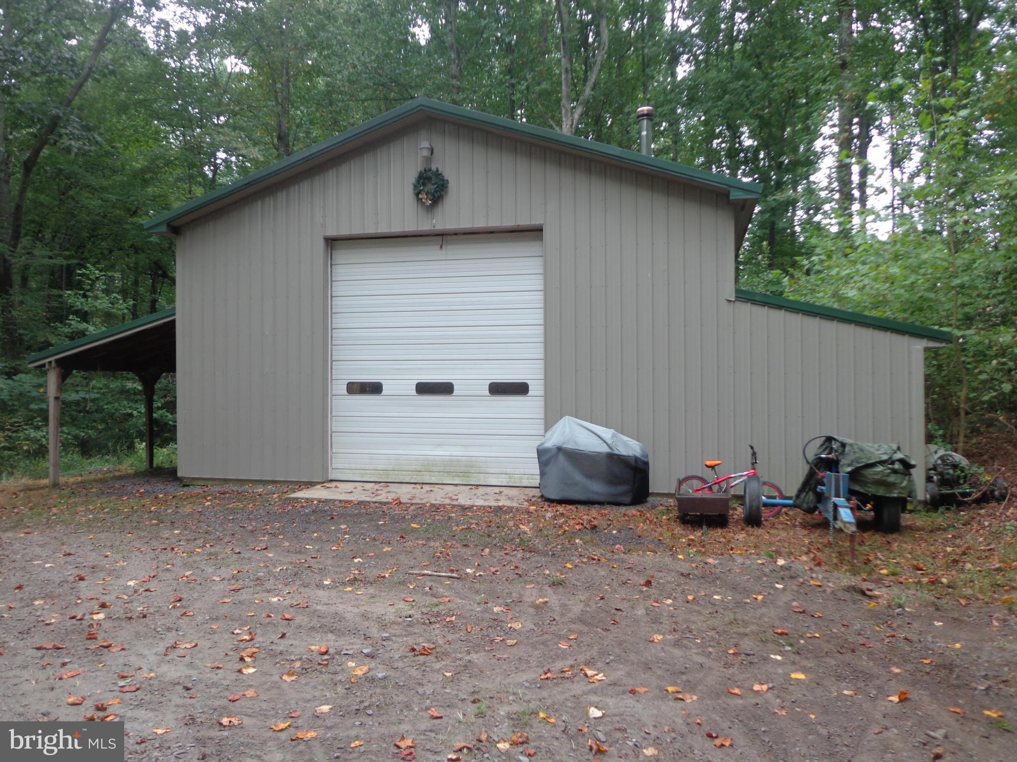 9323 Settle School Road Rixeyville, VA 22737 - Photo 11 of 30 a view of outdoor space with deck and yard