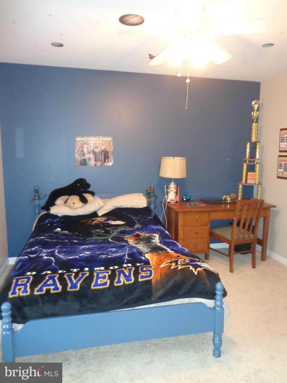 9323 Settle School Road Rixeyville, VA 22737 - Photo 22 of 30 a bedroom with a bed and a lamp