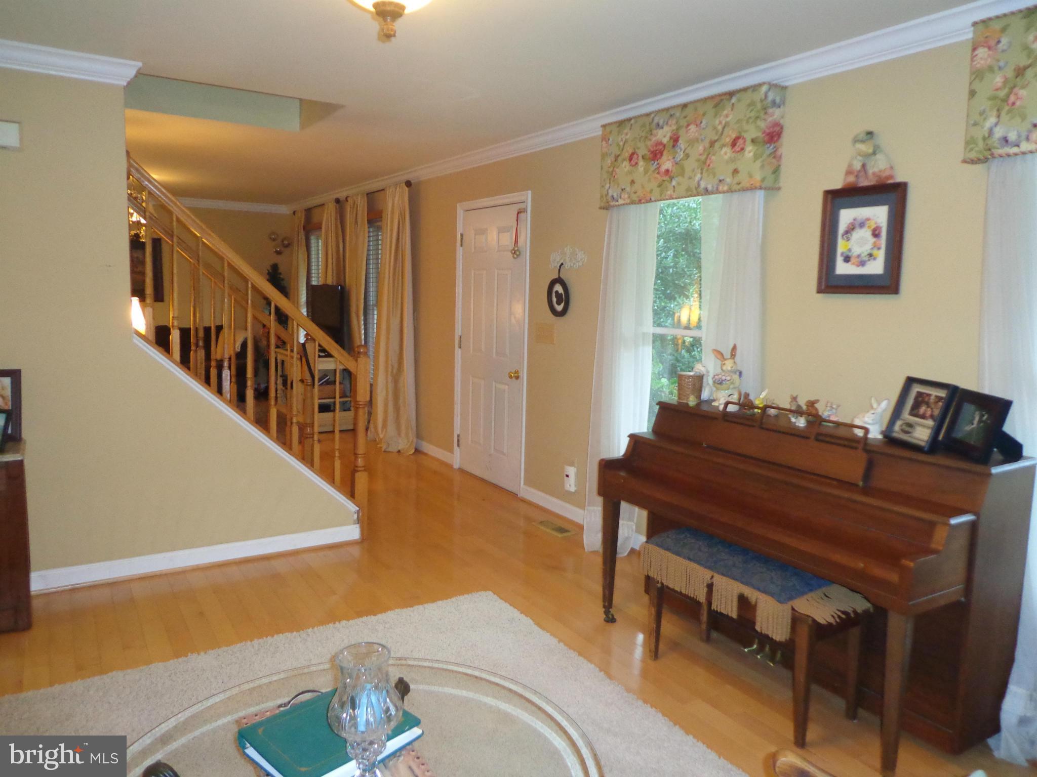 9323 Settle School Road Rixeyville, VA 22737 - Photo 7 of 30 a living room with furniture and a dining table