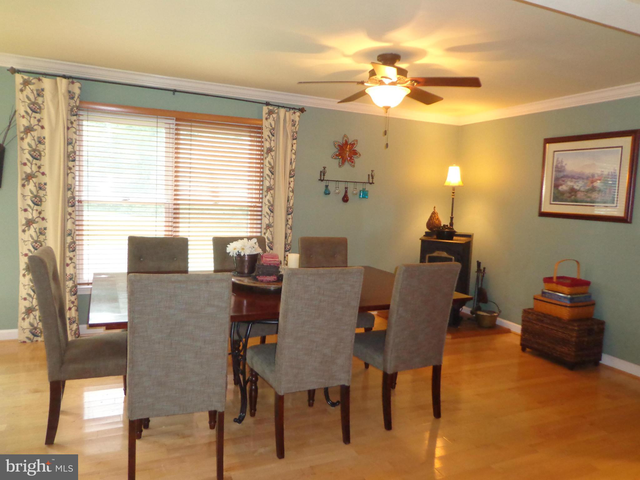 9323 Settle School Road Rixeyville, VA 22737 - Photo 9 of 30 a dining room with furniture and window