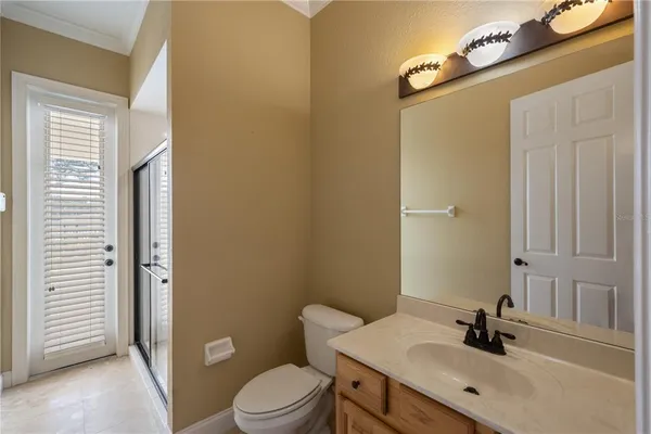a bathroom with a sink toilet tub and shower