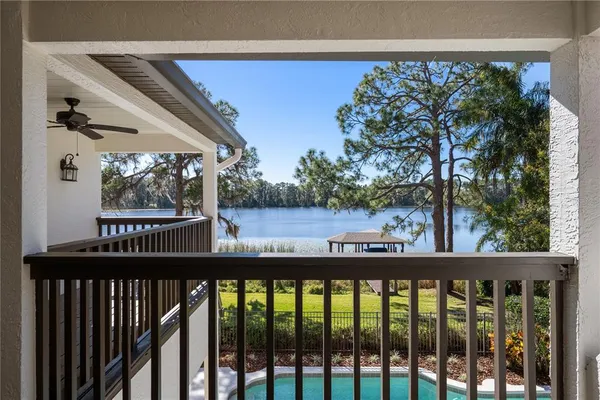 an outdoor view with swimming pool and outdoor seating