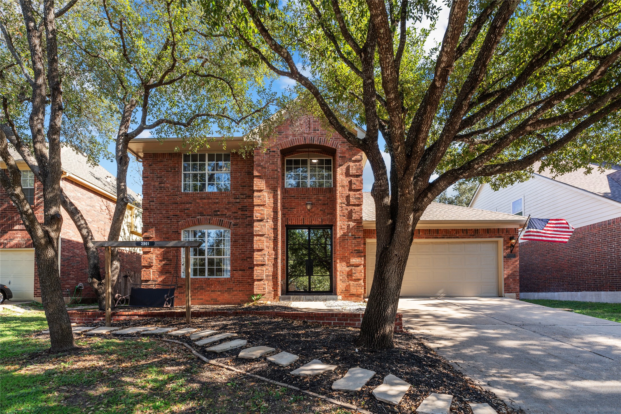 Four bedroom and 2.5 baths.  Two car garage.  Shaded front yard complete with swing.