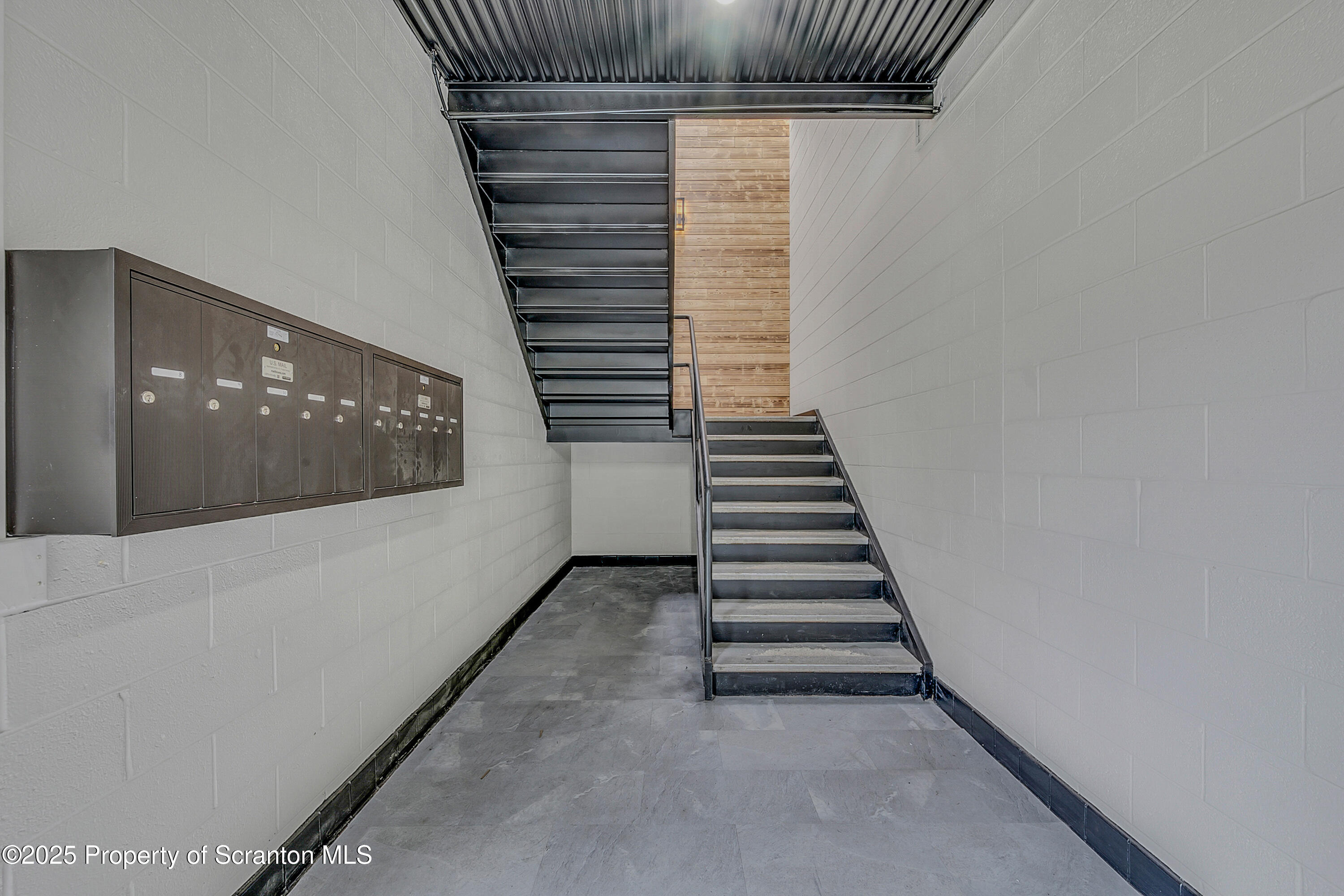 215 Hickory Street, Unit 9 Scranton, PA 18505 - Photo 4 of 19 a view of a hallway with stairs