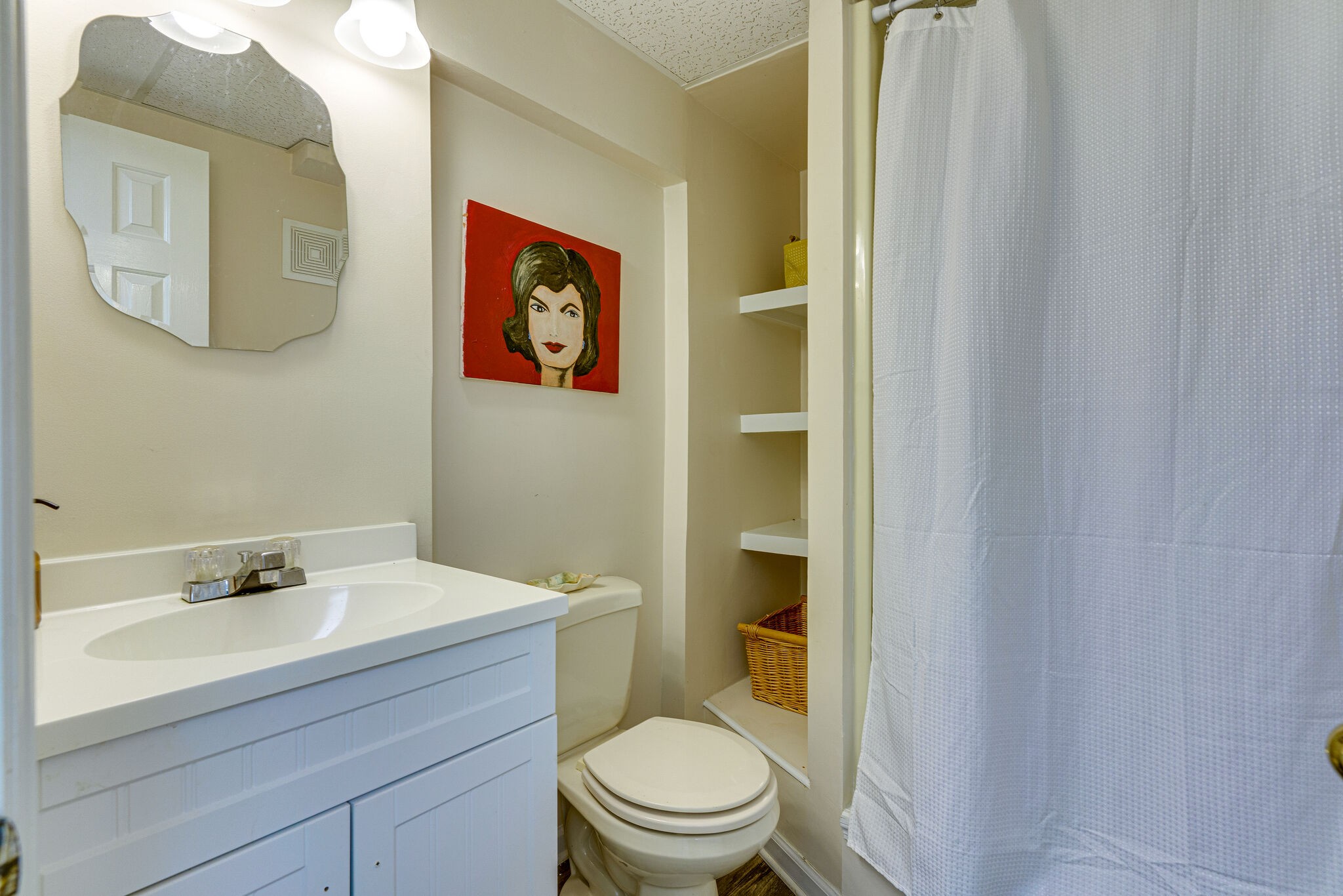 1500 Fallen Beetree Road Kingston Springs, TN 37082 - Photo 27 of 47 a bathroom with a sink a toilet and mirror