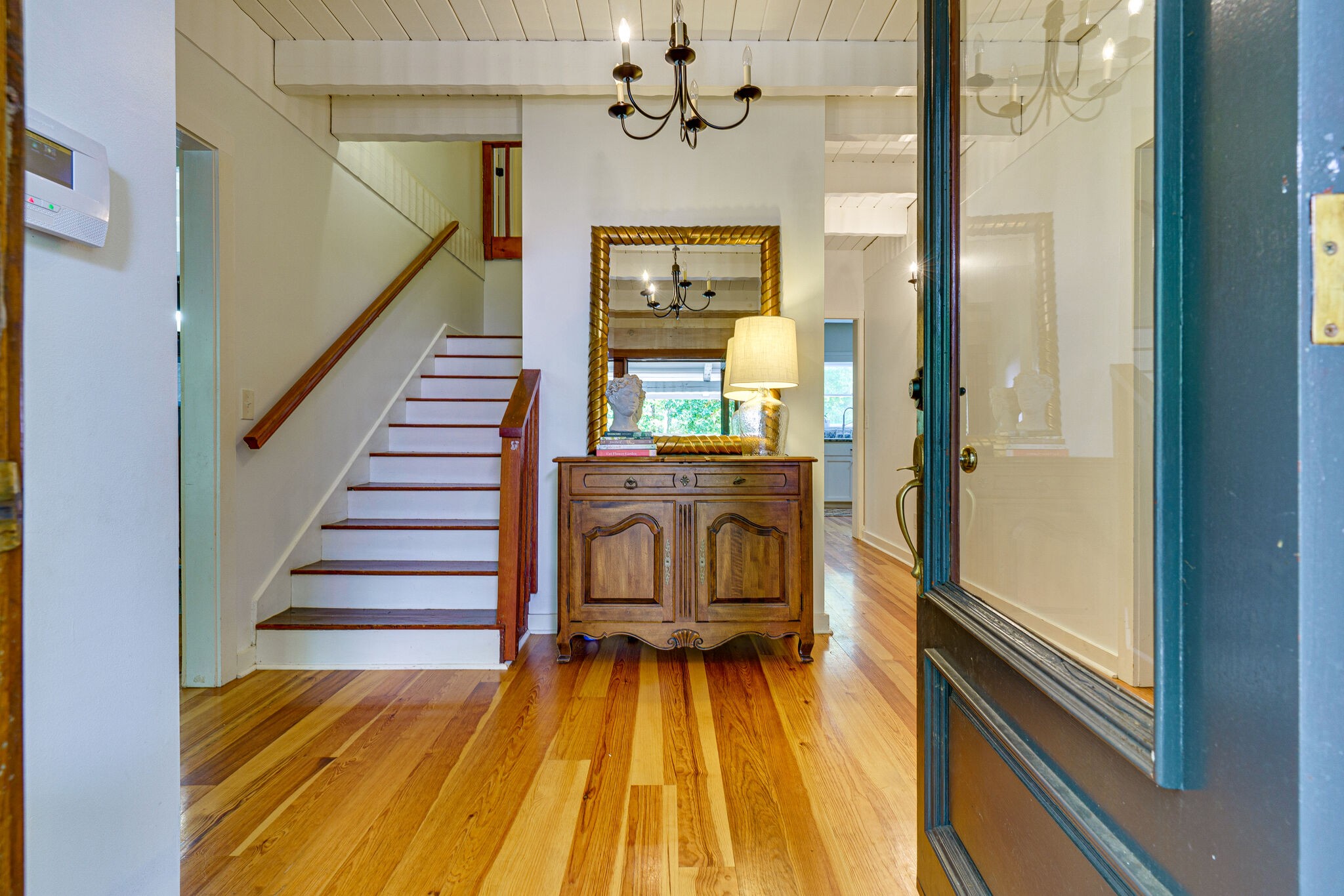 1500 Fallen Beetree Road Kingston Springs, TN 37082 - Photo 3 of 47 a view of a hallway with wooden floor and staircase