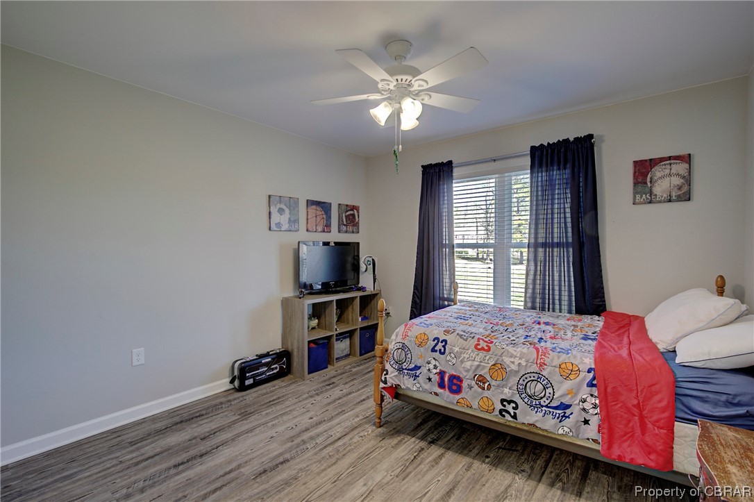 4944 Chestnut Fork Road Gloucester, VA 23061 - Photo 19 of 32 Bedroom with light hardwood / wood-style flooring and ceiling fan