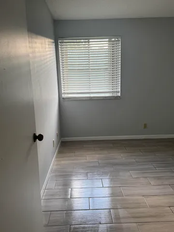 a view of a room that has a window in it