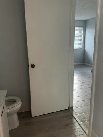 a view of bathroom with a toilet