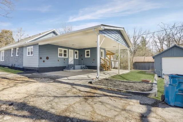 a view of a house with snow on the wall