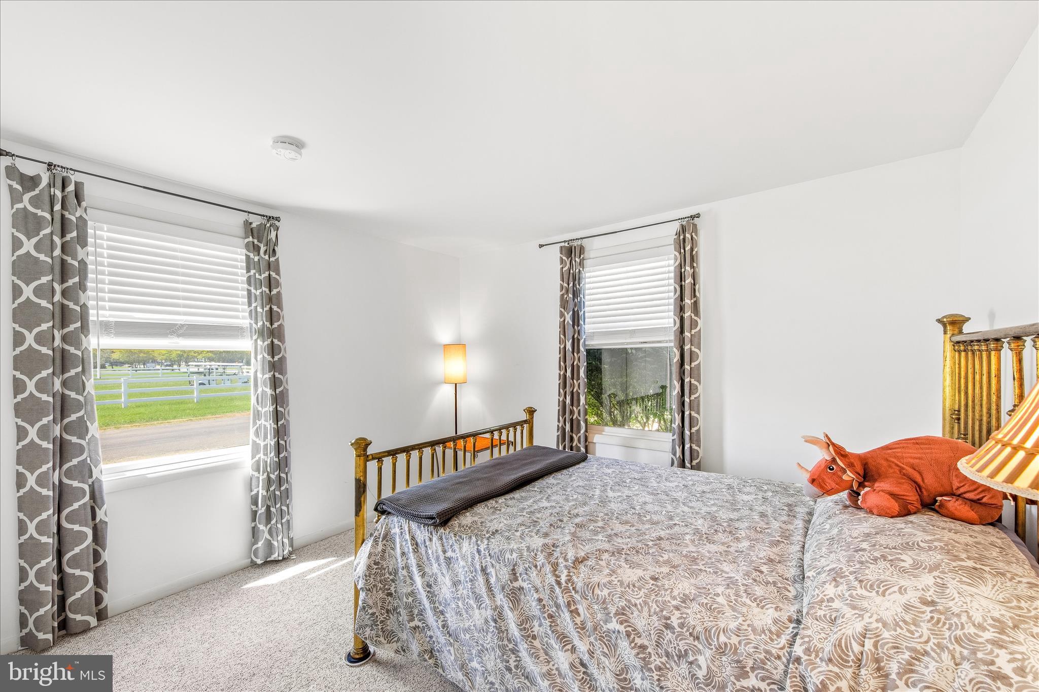 21406 Dogwood Cove Road Tilghman, MD 21671 - Photo 35 of 68 a bedroom with a bed and a window