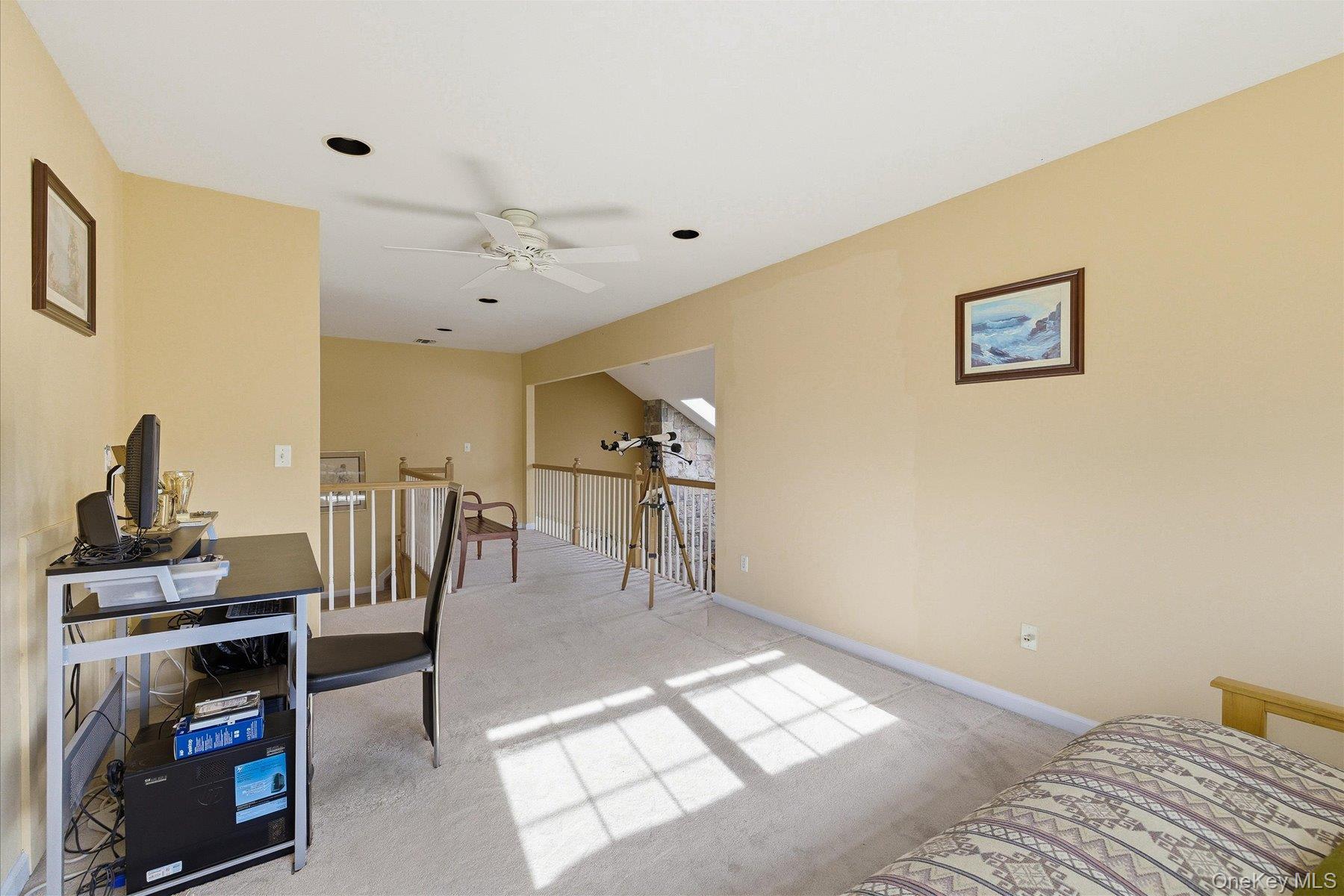 23 Goose Neck Lane Riverhead, NY 11901 - Photo 18 of 28 a view of a livingroom with furniture and a window