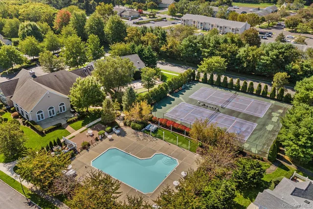 an outdoor space with lots of furniture window