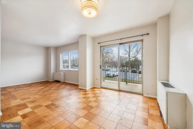 a view of an empty room and window