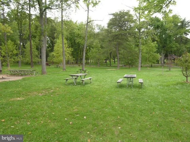 a aerial view of a house with entertaining space