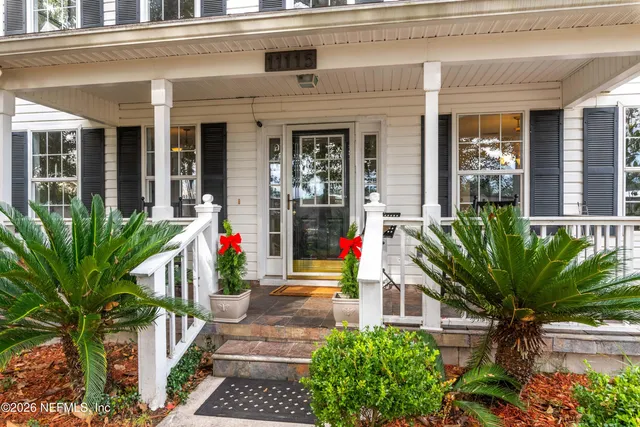 a front view of a house with a porch