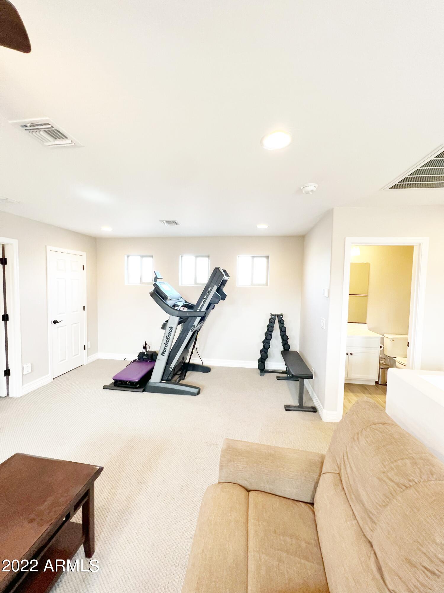 3330 West Fremont Rd. Phoenix, AZ 85041 - Photo 26 of 43 a view of a room with gym equipment
