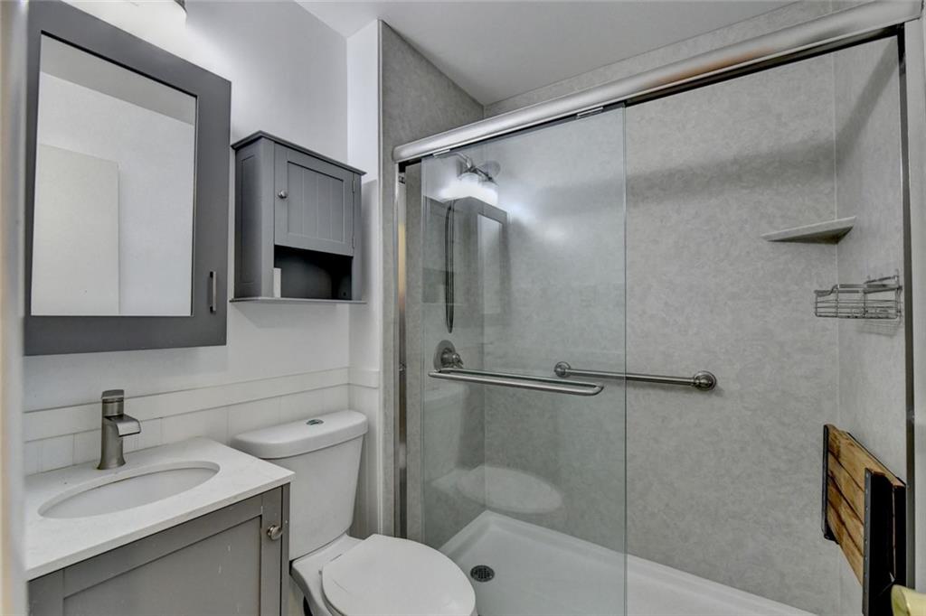 1577 Harbour Oaks Road Tucker, GA 30084 - Photo 39 of 58 a bathroom with a sink toilet and shower