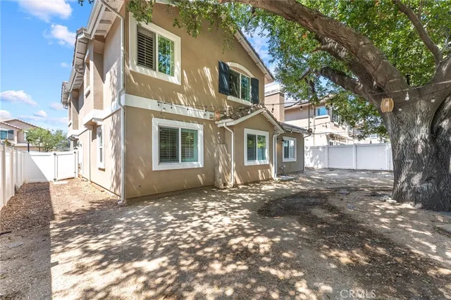 a view of a yard in front of a house
