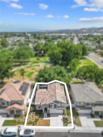 a view of a yard with an outdoor seating