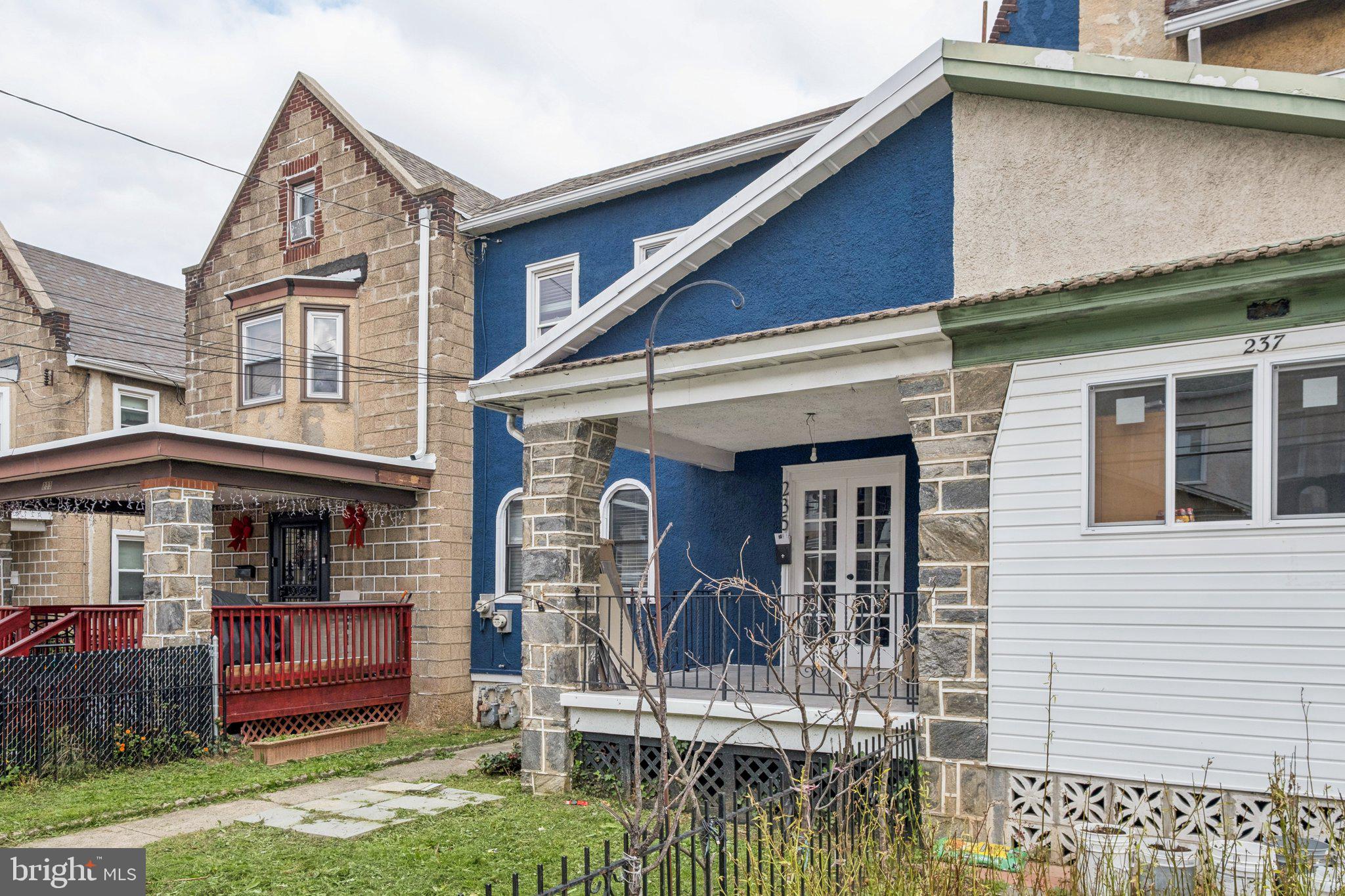 235 Ashby Road Upper Darby, PA 19082 - Photo 2 of 30 a front view of a house with a yard