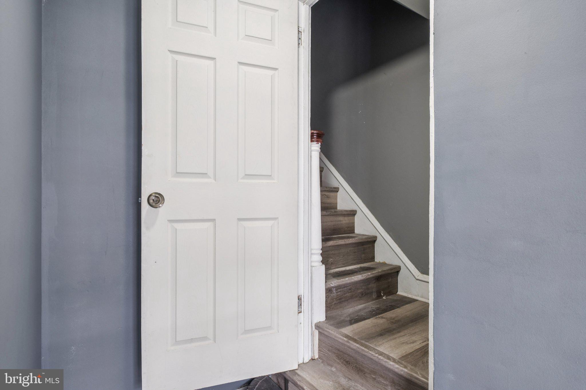 235 Ashby Road Upper Darby, PA 19082 - Photo 27 of 30 a view of staircase with white walls and white door