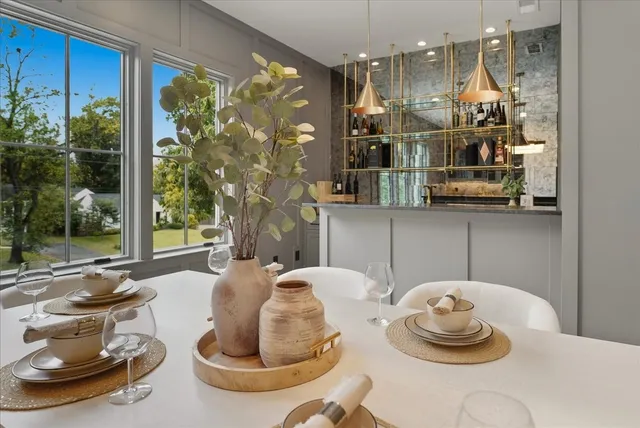 a spacious bedroom with a bed and a couch