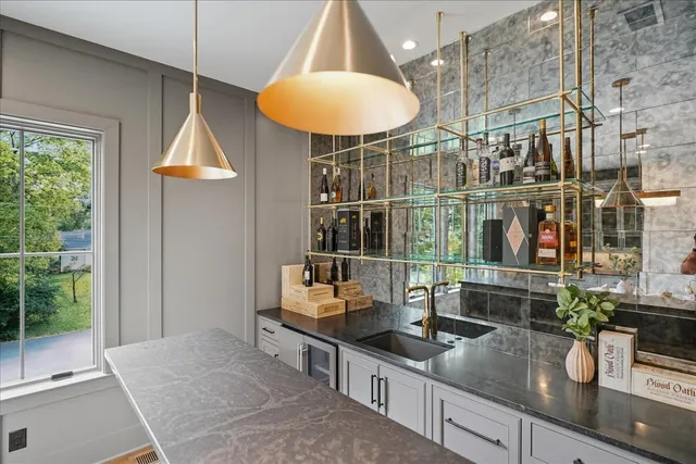 a bathroom with a bathtub and a sink