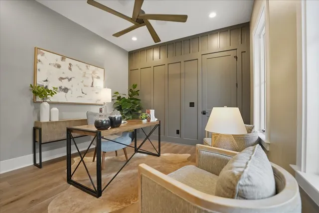 a spacious bathroom with a sink a mirror and a shower