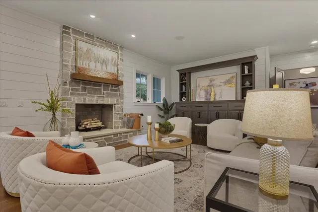 a bathroom with a double vanity sink a mirror and shower