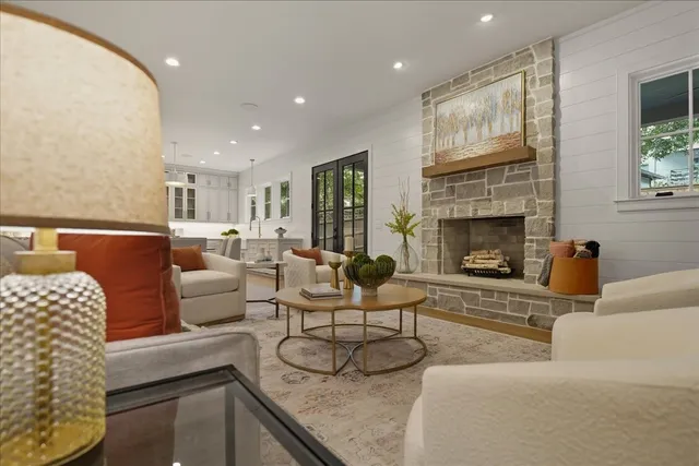 a view of a hallway with chandelier