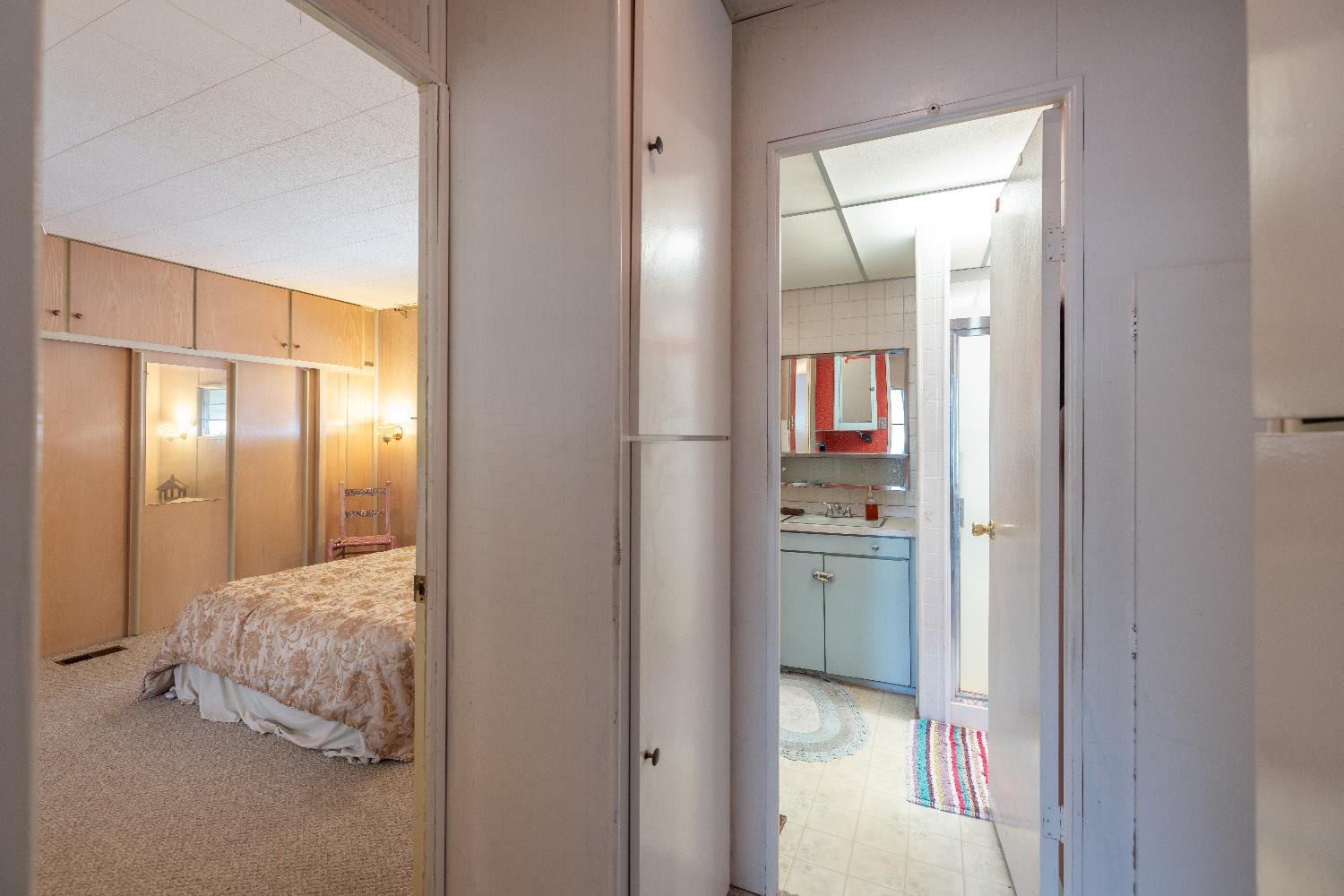 60 Birch Lane Folsom, CA 95630 - Photo 17 of 24 a en suite bathroom with a granite countertop sink and a mirror